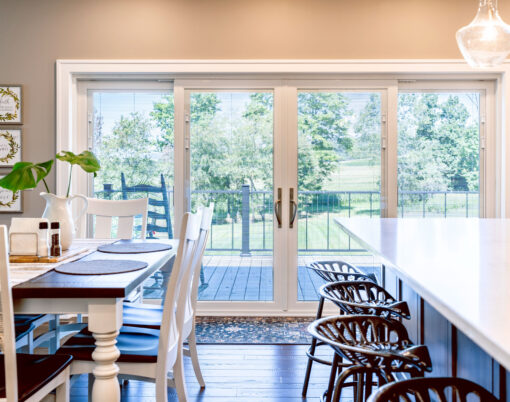 Inside view of an Endure 4-lite sliding patio door in white with white internal blinds