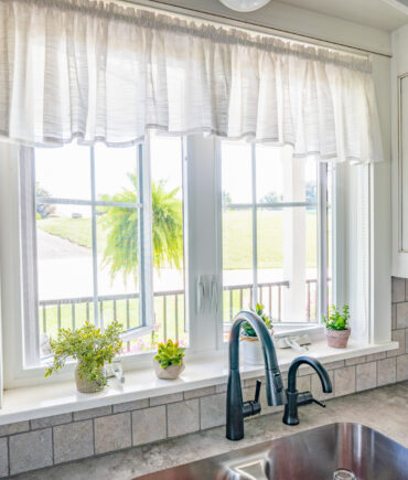 Endure™ Casement Windows in White with Cottage Grids