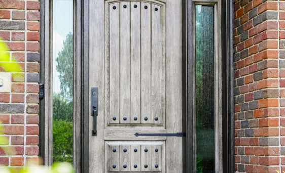 Signet® fiberglass entry door with hinge strap and clavos door accessories