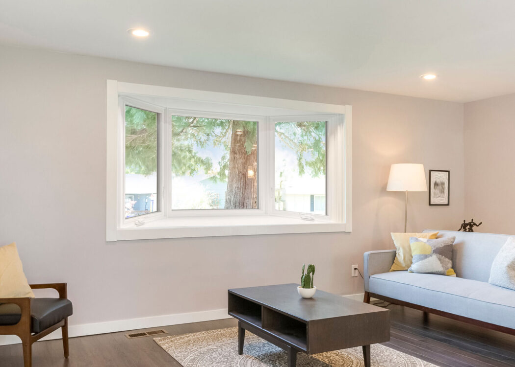White bay window in a family room
