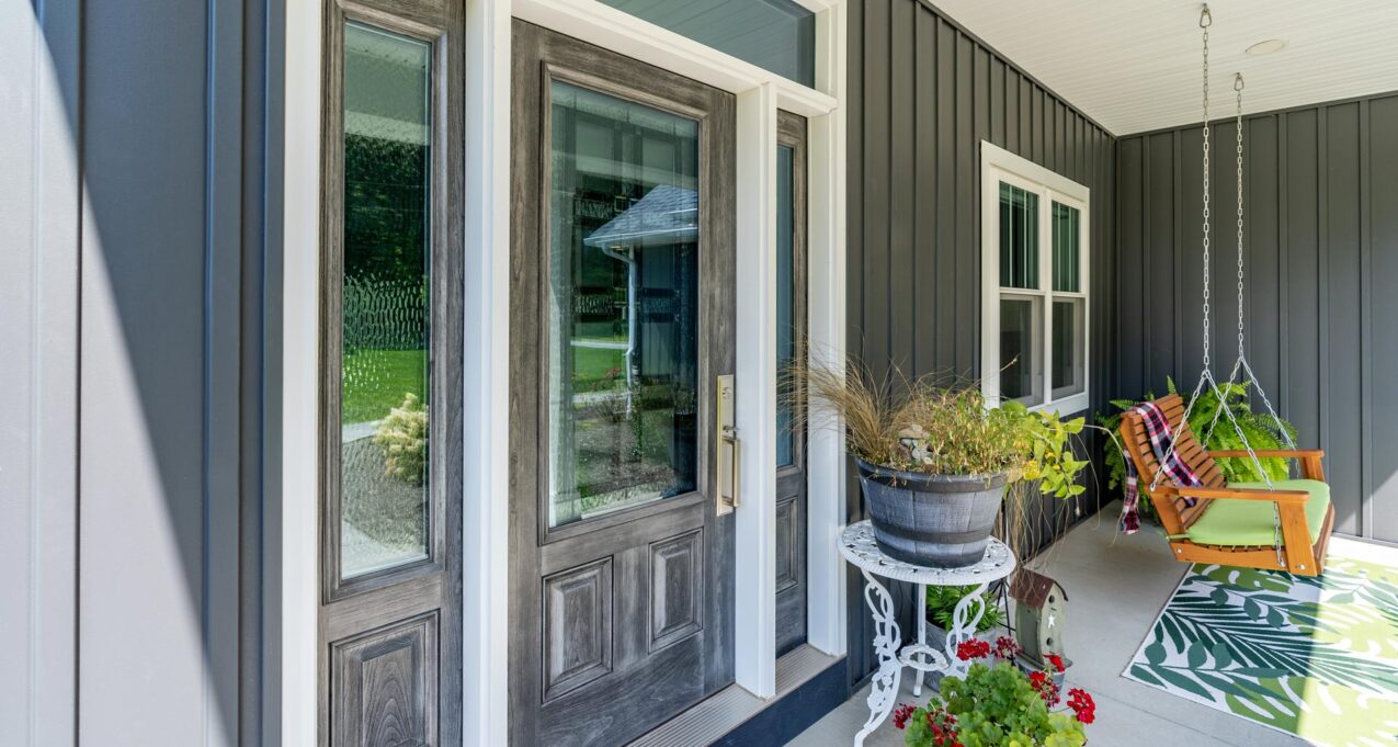 Embarq fiberglass energy efficient front door in Dutch Gray glaze with Laurence decorative glass in the door and sidelites