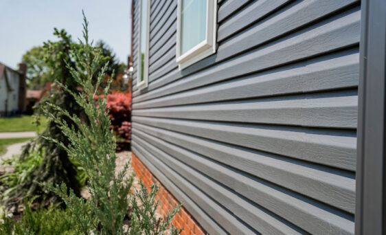 HeartTech® Vinyl Siding in Sea Slate on the side of a home