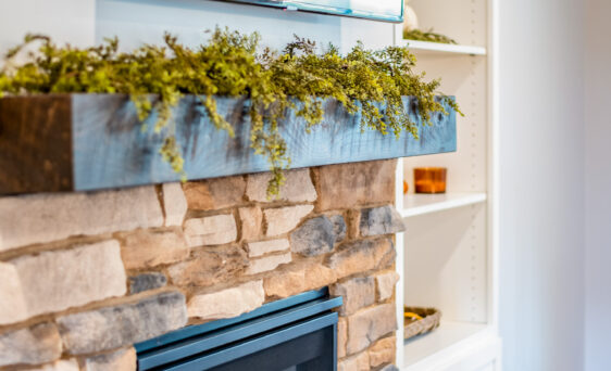 Inside image of a stone fireplace featuring ProVia's Ledgestone profile in Brighton, example of stone fireplaces, Ledgestone stone veneer for fireplaces