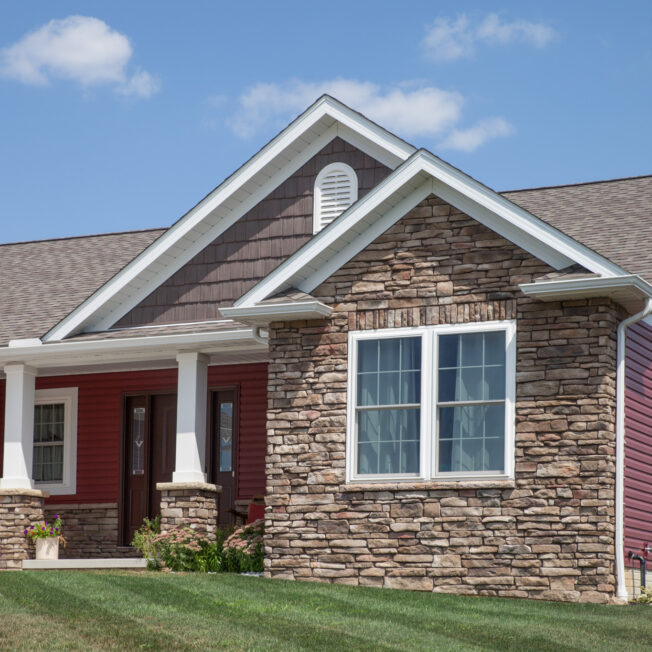 Photo of a home with Ledgestone veneer in the color Susquehanna used as a Ledgestone exterior accent