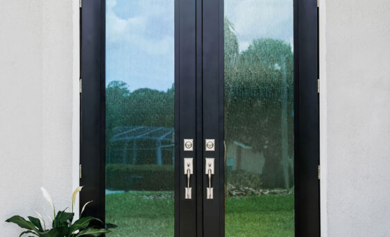 Legacy™ steel French 8 foot doors in Coal Black with Waterfall privacy glass