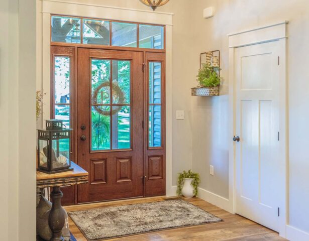 Inside view of a Signet fiberglass door, sidelites, and transom with simulated divided lites; example of a fiberglass door in the blog article steel vs fiberglass door