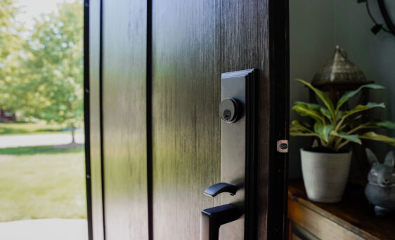 Close-up view of a Signet® Fir entry door in Espresso