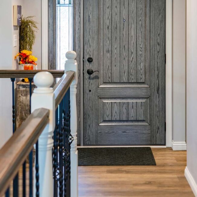 Example of colors for front doors: Interior view of a Signet Oak fiberglass door with a medium gray glaze called Dutch Gray, just one of many options for colors of front doors