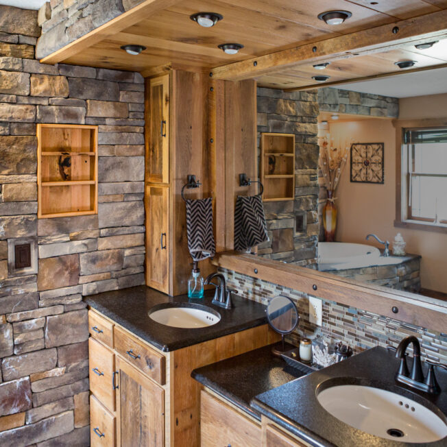 Terra cut manufactured stone veneer in the color Slate in a bathroom, example of using stone for interior walls and accents