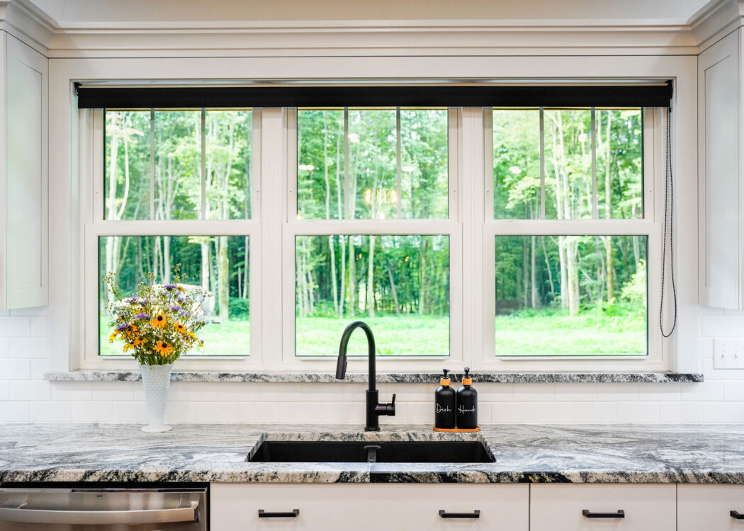 Interior view of white Endure™ Double Hung Windows with Flat Internal Grids in a kitchen