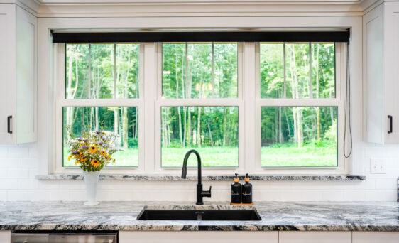 Interior view of white Endure™ Double Hung Windows with Flat Internal Grids in a kitchen