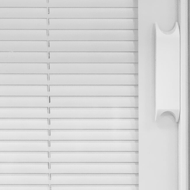 Closeup of ProVia white internal blinds for windows