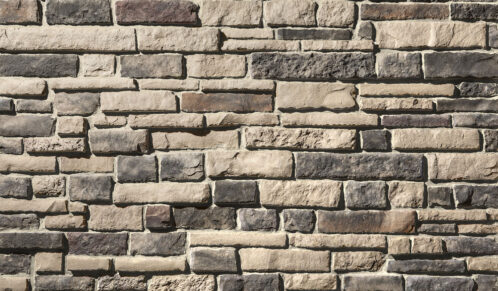 Chisel Cut™ Brindle manufactured stone veneer with Buff colored Grout