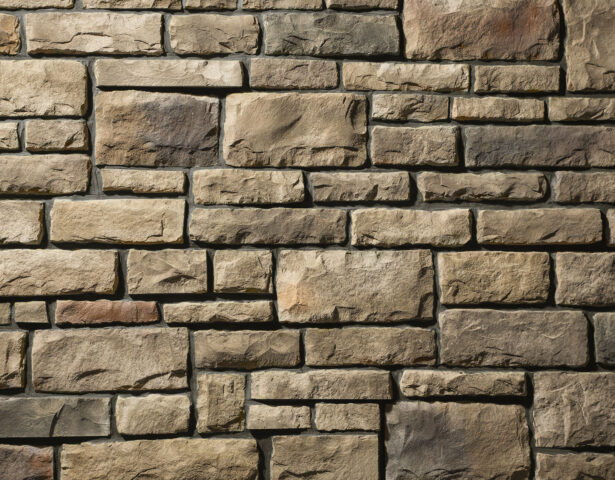 Closeup detail of Buckingham stone veneer, limestone veneer, with Brown grout