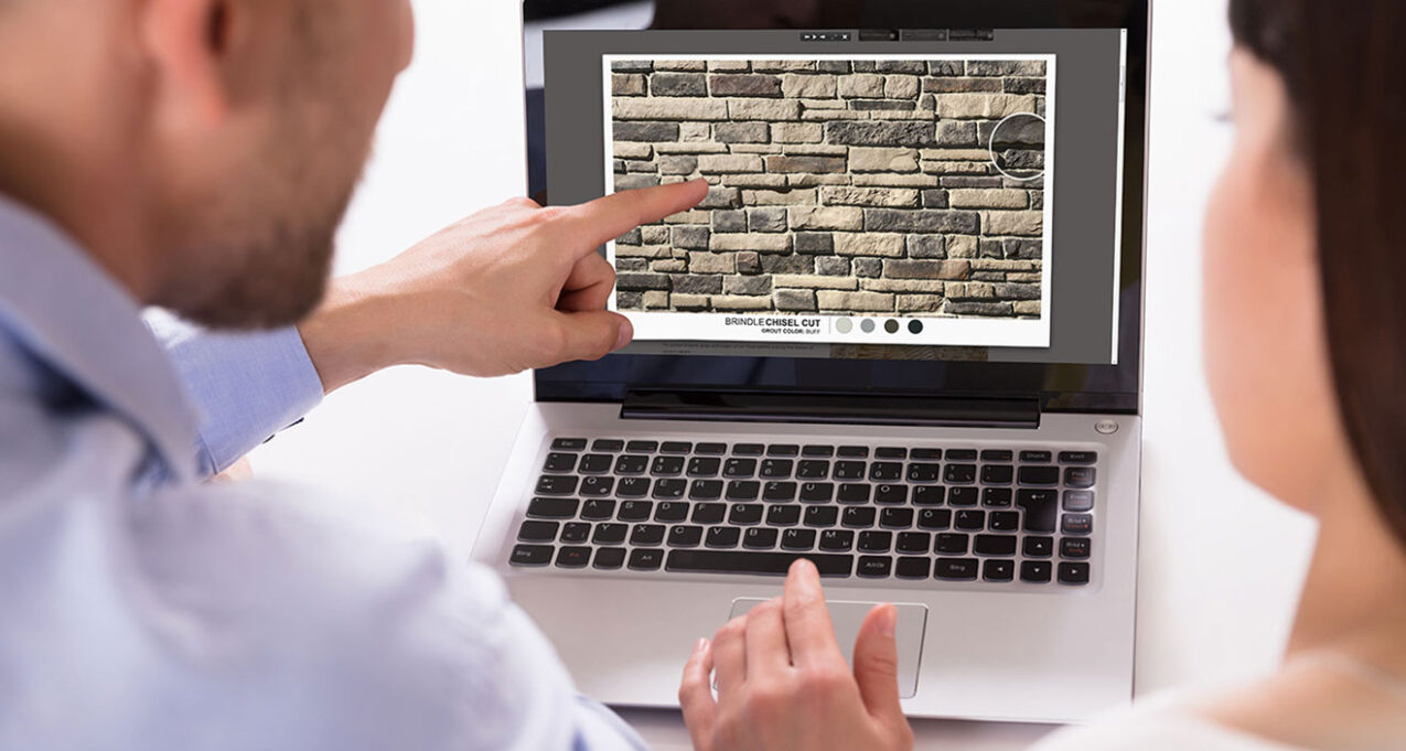 Couple using the stone and grout visualizer on a laptop