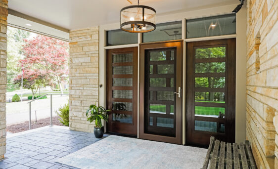 A ProVia Deluxe™ Full View 397 Storm Door in Tudor Brown on a modern-style home