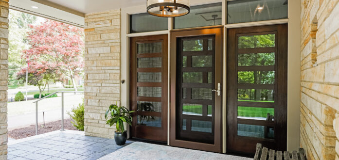 A ProVia Deluxe™ Full View 397 Storm Door in Tudor Brown on a modern-style home