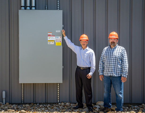 ProVia's Brian Miller (President & CEO) and Steve Ice (Director of Manufacturing) flip the switch to power up the new solar array.