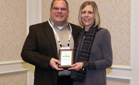 Tricia Hicks (right), Wellness Specialist, accepts 2019 Gold award on behalf of ProVia