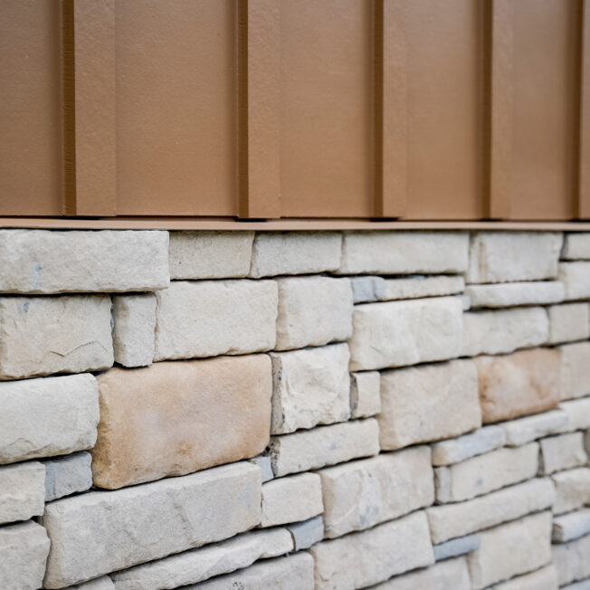 Closeup view of Ottawa Dry Stack manufactured stone veneer on the outside of a home