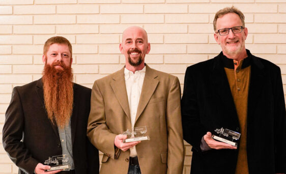 ProVia truck drivers Chris Yoder, Jeff Schlabach, and Tim Gingerich pose with awards as they were inducted into the Million Mile Club