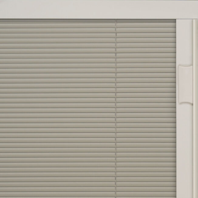 {Closeup view of exterior door with blinds in the color Tan}