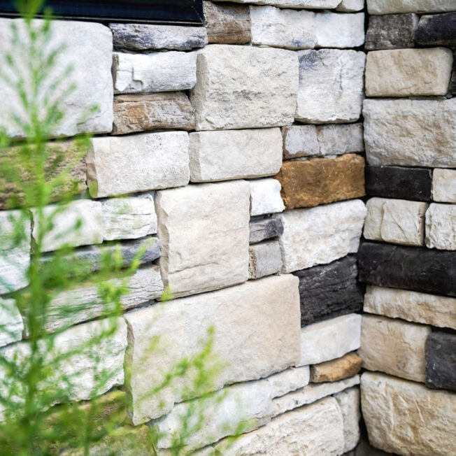 {Closeup of ProVia Terra Cut™ Niagara Manufactured Stone on home exterior}